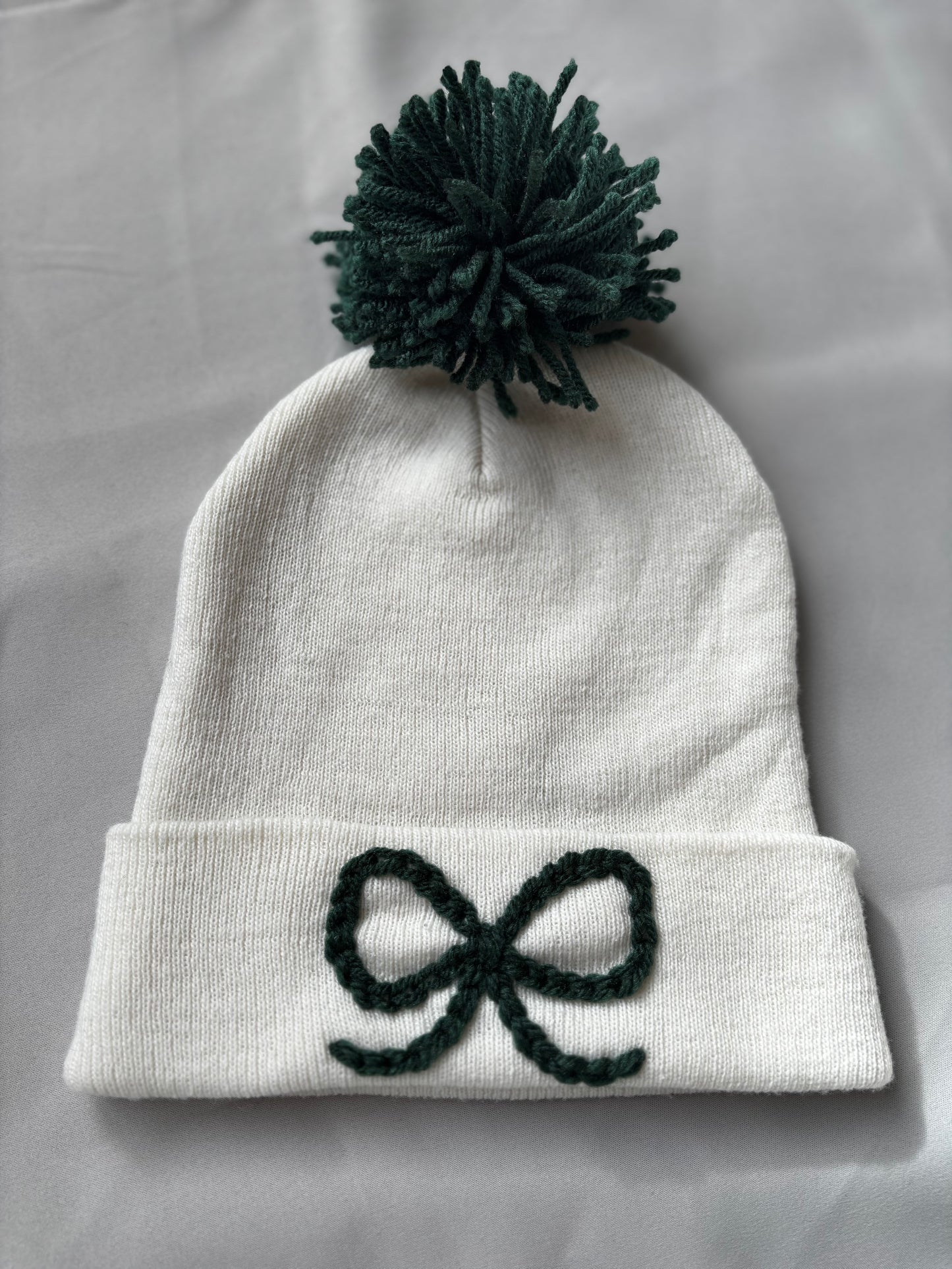 ivory bow beanie